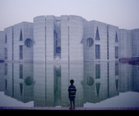 The Capital of Bangladesh with small boy, Dhaka, Bangladesh, Louis I. Kahn, Architect (Image from the film)  2003 Louis Kahn Project, Inc. 